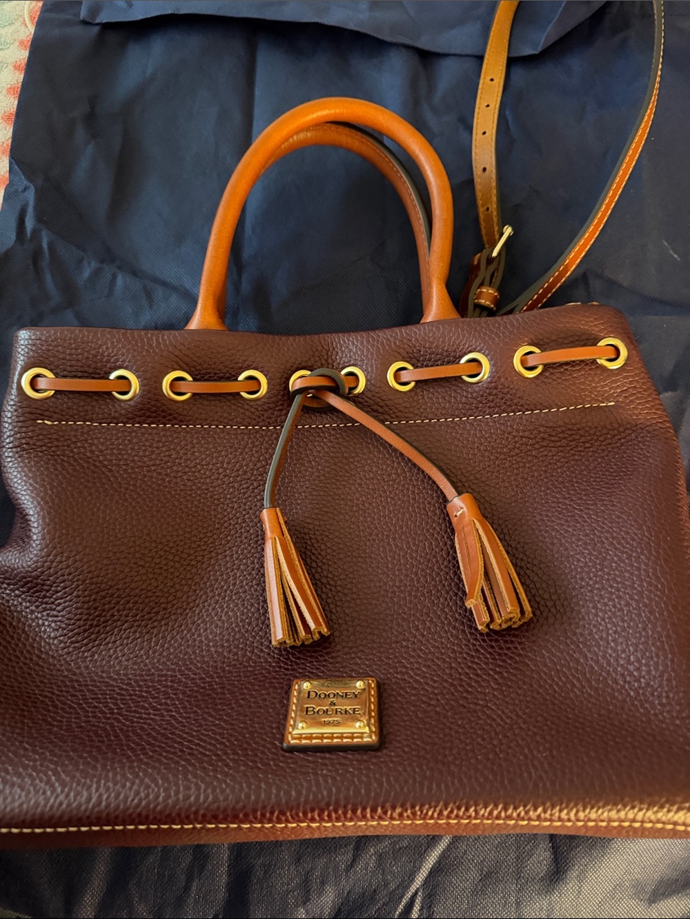 Dooney & Bourke Burgundy Pebble Leather Tassel Tote with chestnut trim